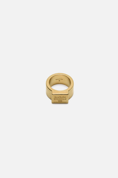 Acne Studios Logo engraved signet ring - Semi matt gold